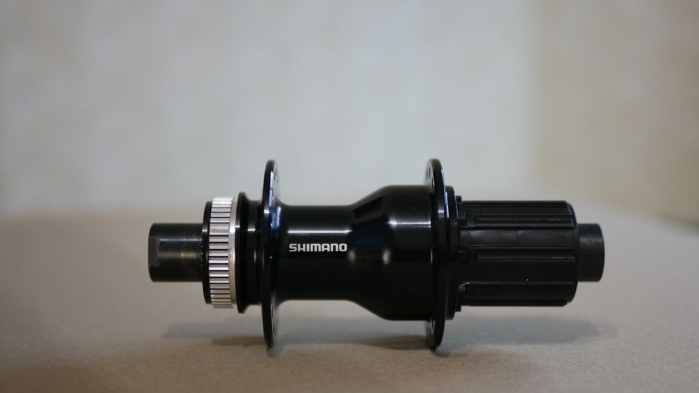 Втулка задняя Shimano FH-TC500-B 8-11-шв. 32отв 12MM THRU TYPE AXLE OLD: 148мм CENTER LOCK EFHTC500HMBB фото у BIKE MARKET